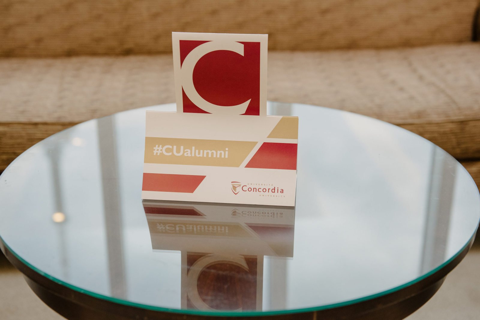 Concordia University alumni relations logo on a table